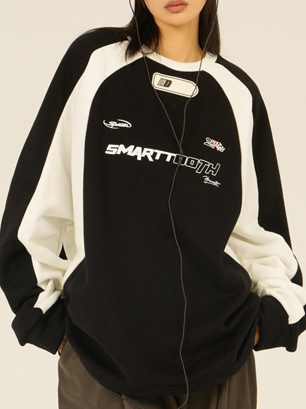 Retro oversized raglansweater met slogan