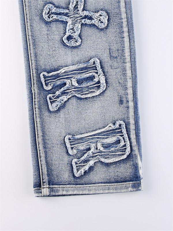 Boyfriend-jeans met vervaagd effect en letterpatch