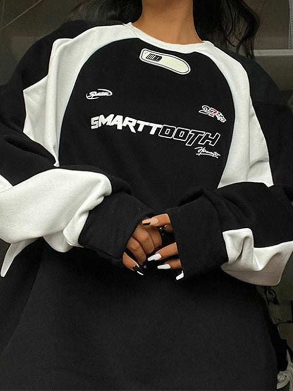 Retro oversized raglansweater met slogan