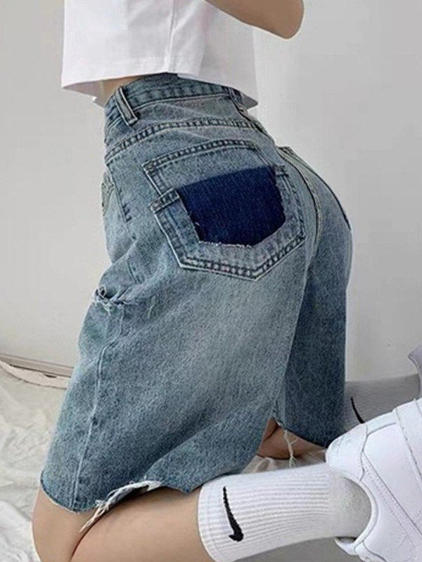 Knielengte denim shorts met ruwe zoom